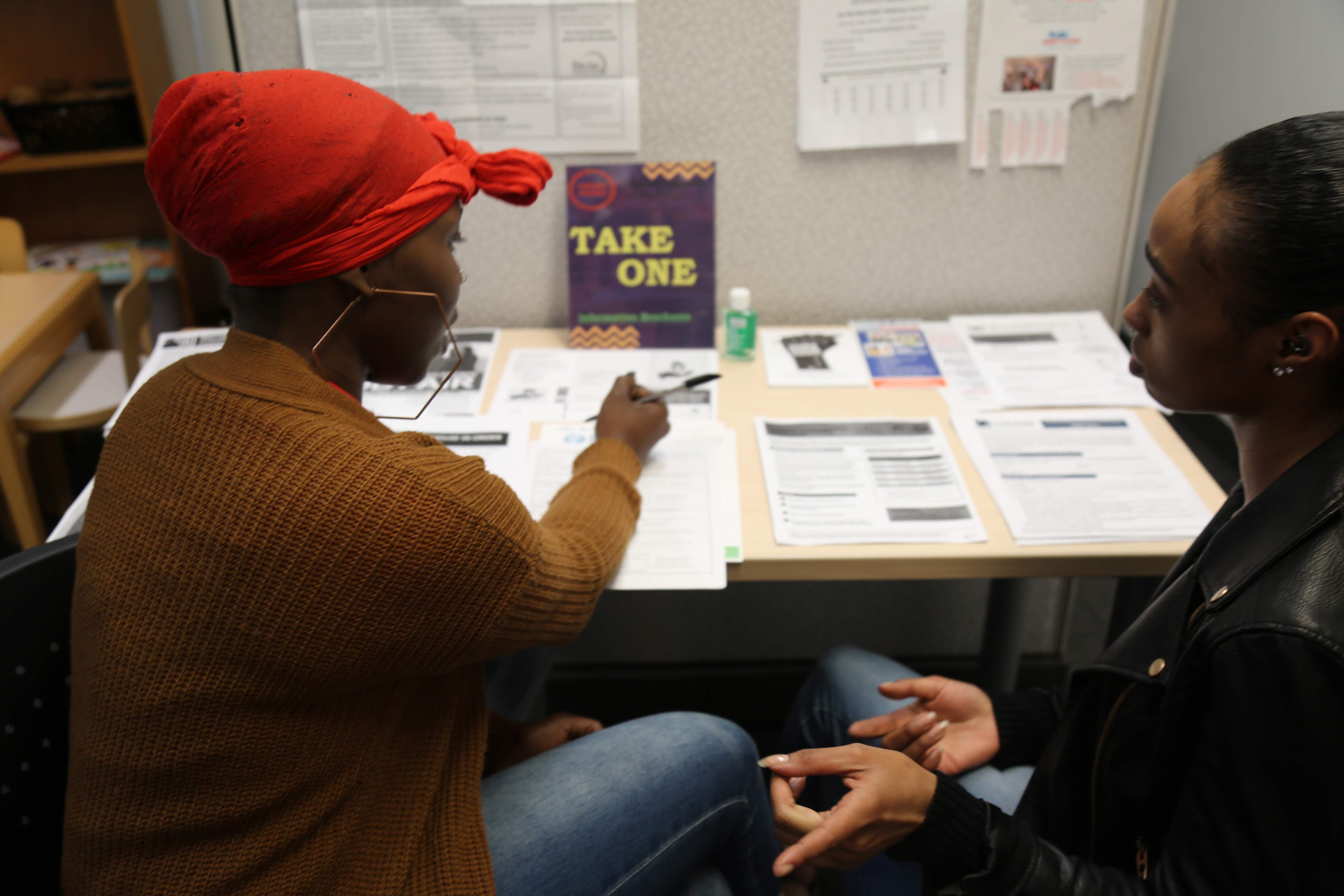 Two women discuss options in our Urban League resource center