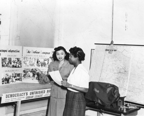 Myrtle White Carr and Gertrude Williams Rae with Urban League display 1956