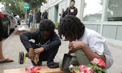 Youth program participants building planters